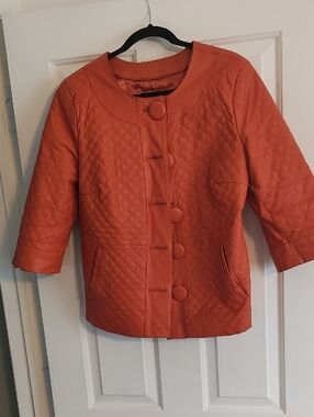 Terry Lewis Orange leather quilted textured jacket